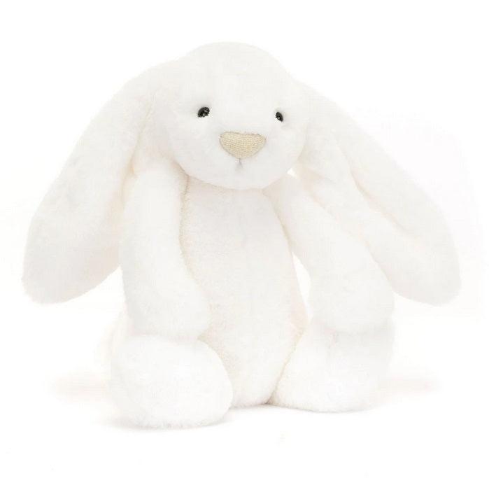 Rabbit! Rabbit! Rabbit! This cute little white bunny Rabbit figurine has  black-tipped ears and shiny black eyes.
