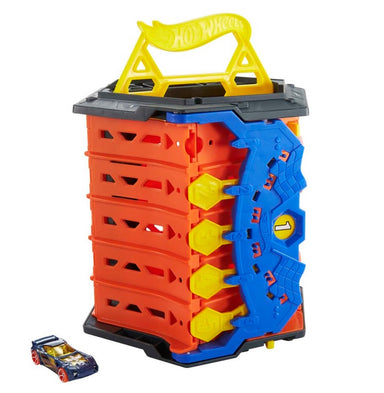 Roll out Raceway in carrying case mode: yellow plastic Hot Wheels handle on top, 5 plastic orange tracks wrap around to form carrying case, blue finish line section at end of track on right side of frame, blue hot wheels sports car on bottom left of frame